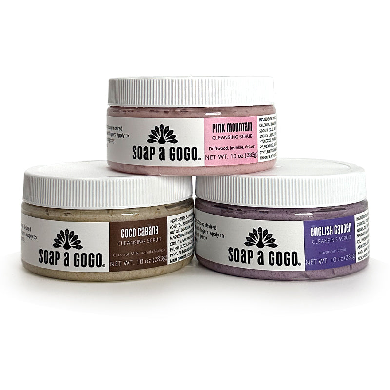 three jars of scrub on a white background