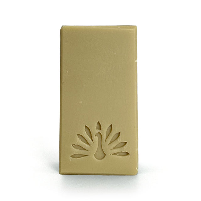 Natural bar of soap on a white background