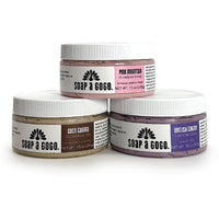 three jars of scrub on a white background