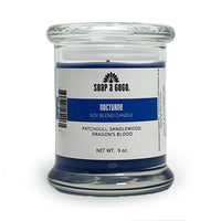 Candle jar with a label on a white background