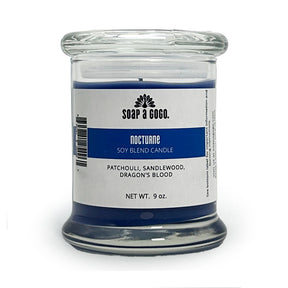Candle jar with a label on a white background