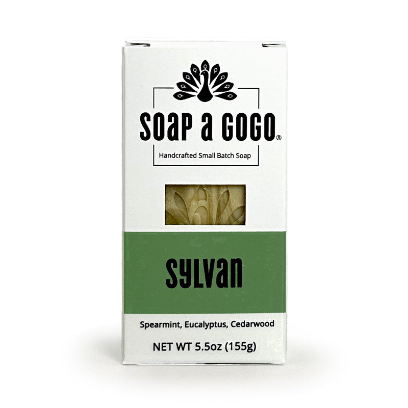 A rectangular white box of Soap a Gogo Sylvan handcrafted small batch soap, featuring a green band with the name 'sylvan' and a small clear window showing the soap bars inside.
