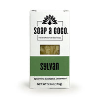 A rectangular white box of Soap a Gogo Sylvan handcrafted small batch soap, featuring a green band with the name 'sylvan' and a small clear window showing the soap bars inside.