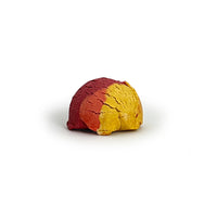 Multicolored bubble bath truffle on a white background