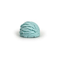 Light blue bubble bath truffle on a white background