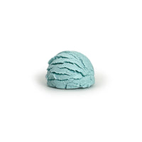 Light blue bubble bath truffle on a white background