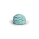 Light blue bubble bath truffle on a white background