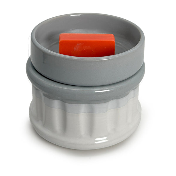 A Paloma wax melt in a wax warmer