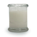 Soy blend candle in a clear glass jar with glass top