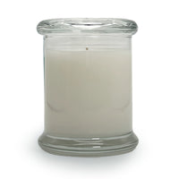 Soy blend candle in a clear glass jar with glass top
